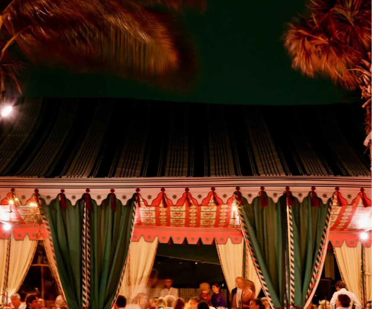 Green and White Striped Canopy at Night